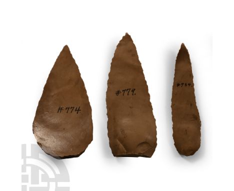 Neolithic Period, circa 6th-4th millennium B.C. Leaf-shaped flakes of curved profile, one with cortex to base; each with inke