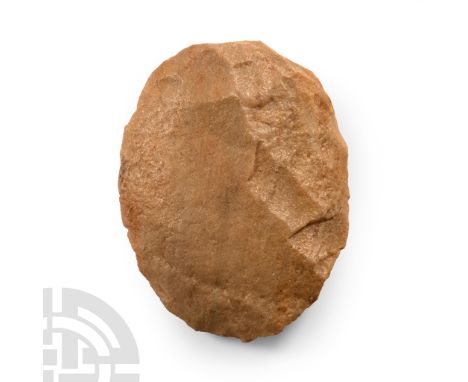 Neolithic Period, circa 6th-4th millennium B.C. Biconvex in profile with some abrasion, rounded cutting edge. Cf. MacGregor, 