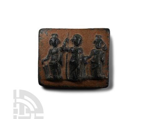 1st-4th century A.D. Square panel with three figures modelled in the half-round - Isis Fortuna with a rudder, Minerva with a 