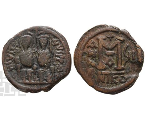 AD 565-578. Nicomedia mint. Dated RY 7 (AD 572/573). Justin and Sophia, both nimbate, enthroned facing; Justin holding globus