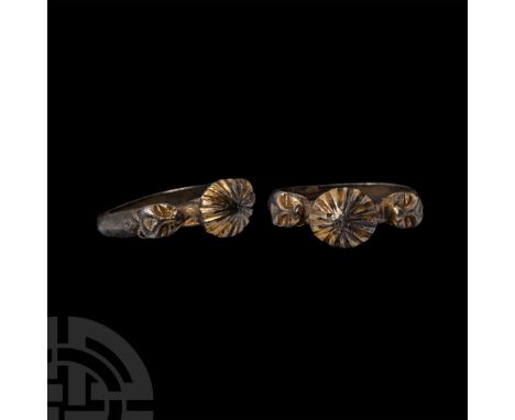 13th-14th century A.D. D-section hoop with spur to each shoulder formed as a beast-head biting the shank, bezel triangular in