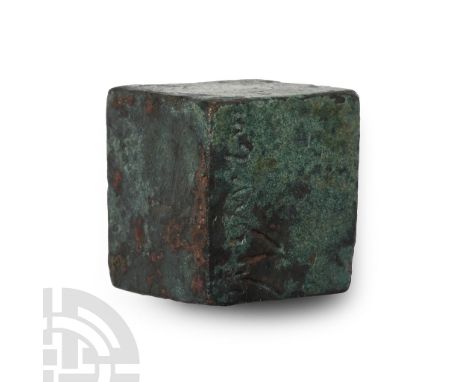 BRONZE TO IRON II AGE, CIRCA 12TH-6TH CENTURIES B.C. In the form of a cube engraved on one side in Aramaic: ŠLŠRKR.&nbsp;Hend