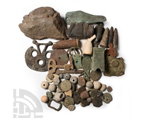 Mainly 2nd-18th century A.D. Including a bronze coin, buckle loops, glass marbles, lead tokens, thimbles, furniture fittings,