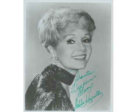 Debbie Reynolds (1932-2016), American actress A signed and dedicated 10x8 inch photo Her breakout role was her first leading 