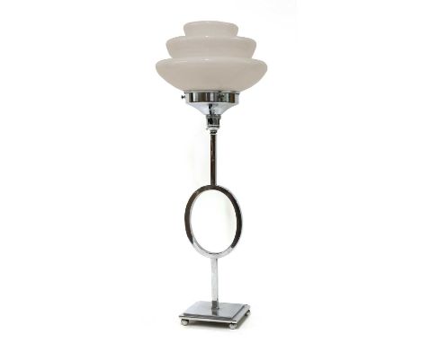 An Art Deco chrome and milk glass table lamp,with a central hoop to the column, 60cm high, andanother table lamp, with a pink