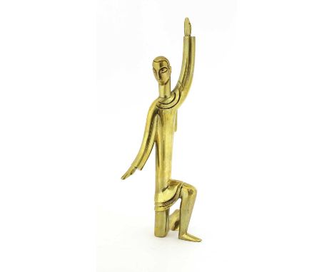 A Hagenauer polished brass figure of a kneeling man,possibly Jesus or a disciple modelled wearing a cloak, one hand raised, t