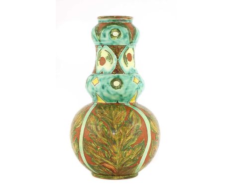 A Della Robbia pottery double gourd vase,incised with bands of designs, the lower body with leaf details, on a brown and turq