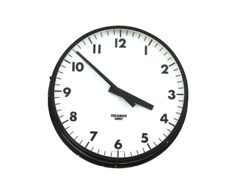 A large illuminated Chloride Gent station clock, the white enamel circular dial with Arabic numerals within a black painted m