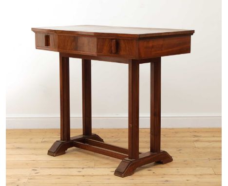 An Art Deco mahogany console table,possibly designed by Betty Joel, the plain top with a canted front, over a single drawer, 