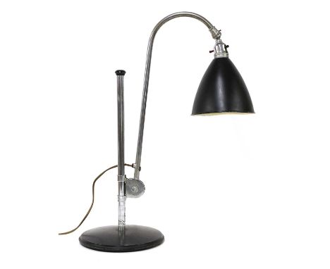 A Bestlite chrome and black enamel adjustable reading/student's lamp,by Robert Dudley Best (1892-1984), a chrome column uprig