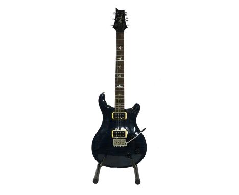 A 1997 PRS Custom 22 electric guitar,serial number 7****7, of typical form with bird inlays to the fingerboard, the figured t