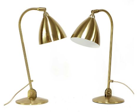 Two pairs of contemporary Bestlite lamps,with adjustable hinged columns, one pair with brass shades, the other pair with whit