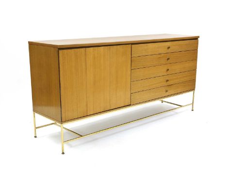 An 'Irwin Collection' mahogany sideboard,1950s, designed by Paul McCobb for Calvin Furniture, Grand Rapids, with an hinged th