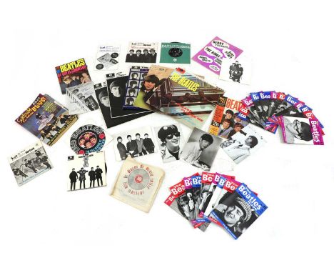 A collection of The Beatles vinyl records and ephemera,comprising a Decca contract mono pressing of 'Please Please Me', 2 x m