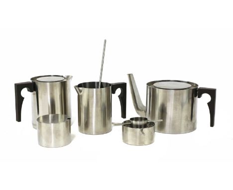 A Stelton 'Cylinda-line' stainless steel tea set,designed by Arne Jacobsen, comprising:a teapot,hot water jug,milk jug,sugar 