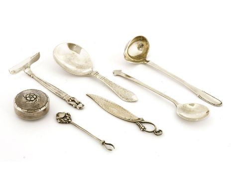 Georg Jensen items,a beaded ladle,a caddy spoon, Continental pattern,a butter knife, ornamental pattern,a feeder, acorn patte