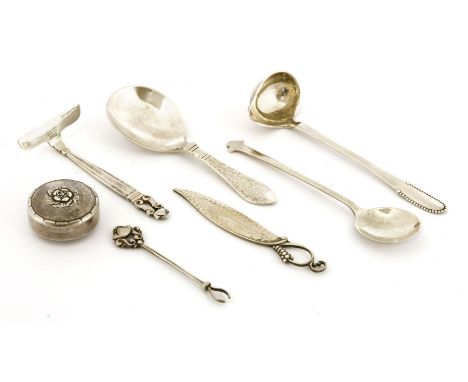 Georg Jensen items,a beaded ladle,a caddy spoon, Continental pattern,a butter knife, ornamental pattern,a feeder, acorn patte