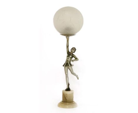 An Art Deco spelter and onyx table lamp,modelled as a dancer holding a globe,14.5cm diameter50.5cm high