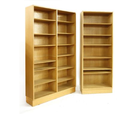 Two light oak open bookcases,by Hundevad, with adjustable shelves, on plinth bases, one labelled,70 and 108cm wide30.5cm deep