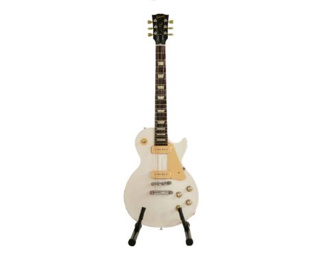 A 2011 Gibson Les Paul Studio electric guitar,serial number 1***1***0, with P90 pickups in a matte white finish, complete wit