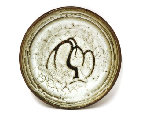 *David and John Leach (1911-2005), a Lowerdown stoneware pottery charger, with a willow tree decoration, impressed marks,35cm