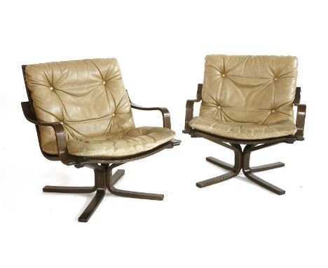 A pair of bentwood and light brown armchairs,72cm wide (2)