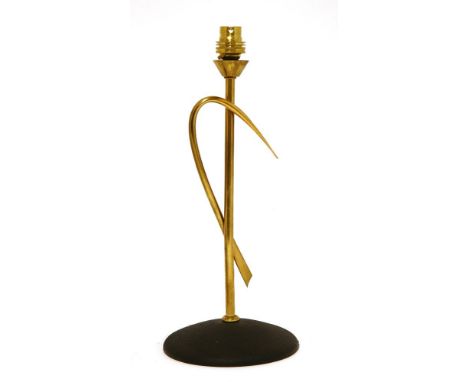 A brass and black lacquered table lamp