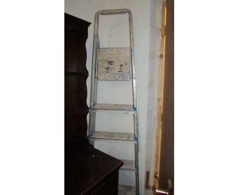 A six tread aluminium step ladder.  (Collect only)