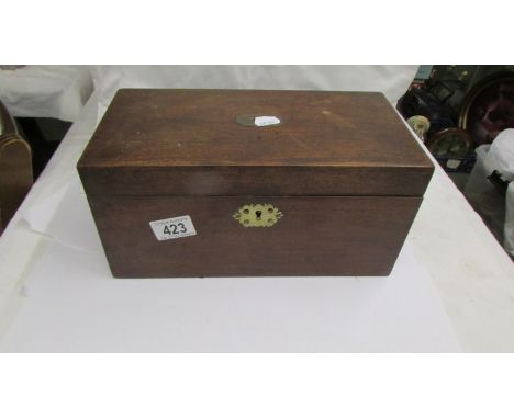 A mahogany tea caddy.