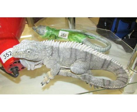 A ceramic bearded dragon and another bearded dragon. ****Condition report**** Green dragon is pottery.Grey dragon is resin & 