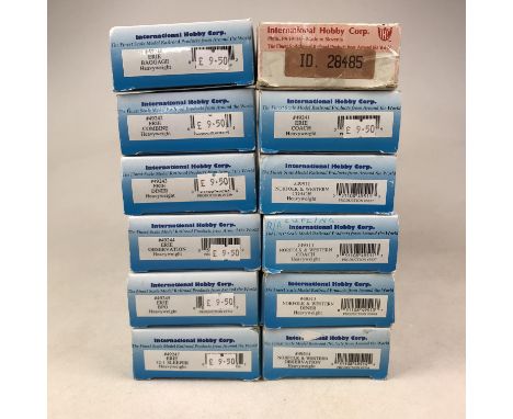 Twelve boxed International hobby corp (IHC) HO gauge models including 7 ERIE livery Model No #49240 / 49241 / 49242 / 49243 /
