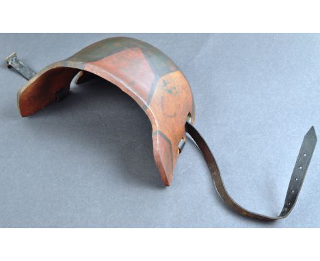 A WWI First World War Imperial German / Prussian Army M16 helmet brow plate / Stirnpanzer. The steel plate painted in jigsaw 