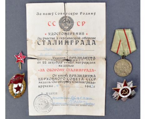 A WWII Second World War Russian Soviet medal group comprising&nbsp;Soviet Army Order of Great Patriotic War badge (numbered 1