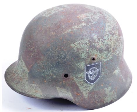 An original WWII Second World War Third Reich Nazi German Army stahlhelm M35 pattern steel uniform combat helmet shell. Later