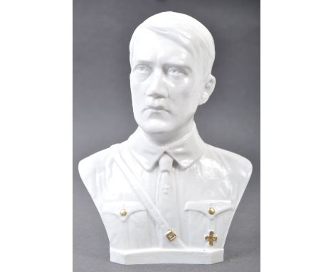 A post war white porcelain sculpted bust of German Third Reich Nazi party leader Adolf Hitler. The bust depicting a uniformed