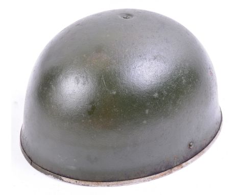 A 20th Century British Army Airborne / Paratrooper helmet. Green painted steel construction with canvas chin strap and cushio