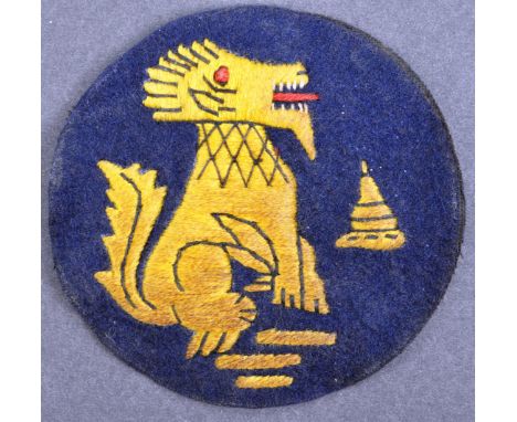 A WWII Second World War Chindit Division / Long Range Penetration Groups cloth patch / badge. The navy blue circular patch wi