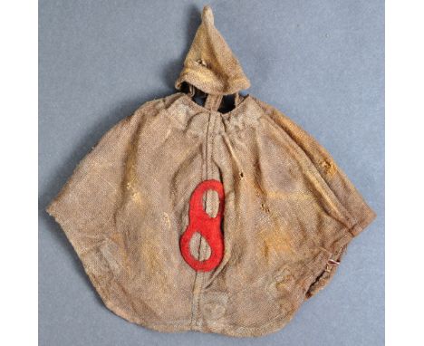 A WWI First World War Imperial German Army / Prussian Infantry related Pickelhaube canvas helmet cover. Usual form, with cent