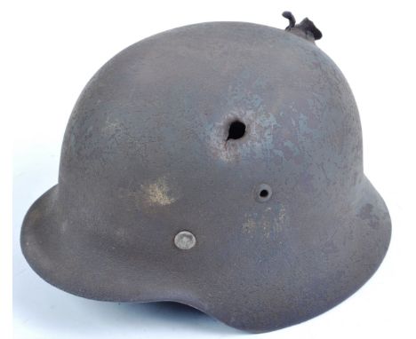 An original WWII Second World War Third Reich Nazi German Army issue M35 pattern Stahlhelm steel combat helmet. Original, ret