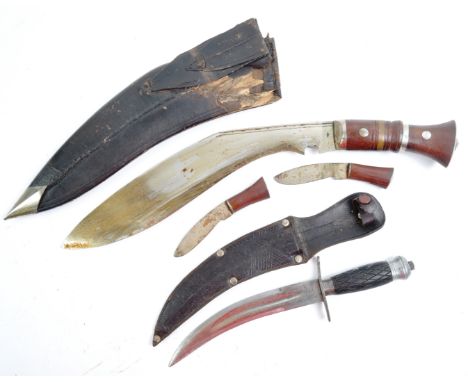 Edged Weapons - an original WWII Second World War period Gurkha Kukri knife / machete. Typical curved blade, with wooden hand