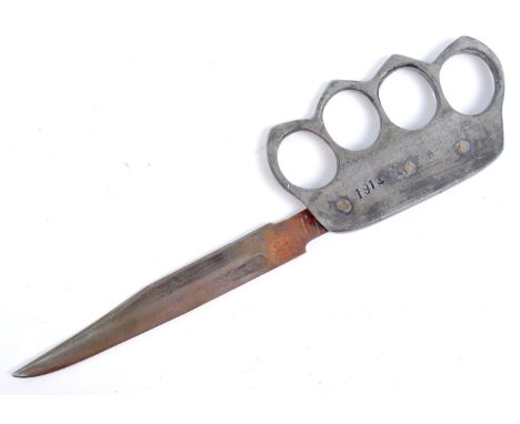 An original WWI First World War British Army trench fighting dagger. The hilt with knuckle protector / knuckles and dated 191