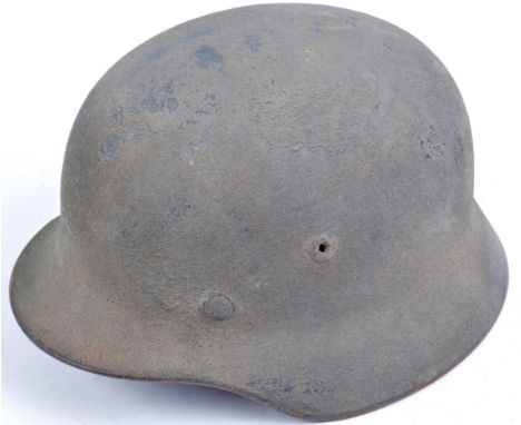 An original WWII Second World War Third Reich Nazi German Army issue M40 pattern Stahlhelm steel combat infantry helmet. Impr