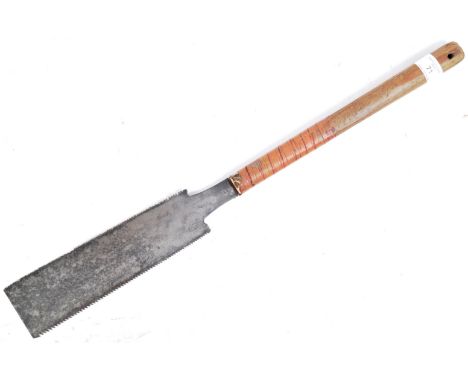 A WWII Second World War Japanese Army bamboo cutting Ryoba knife / sword. The sword having a long wooden handle half wrapped 