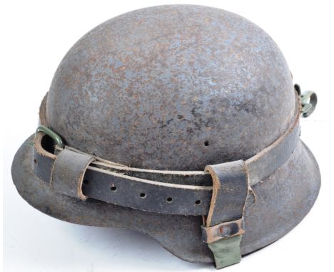 An original WWII Second World War Third Reich Nazi German Army stahlhelm M42 pattern steel uniform combat helmet shell. Later