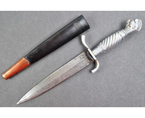 A pre WWII Second World War German Korium styled dagger. The dagger having an eagle claw to the pommel, ribbed steel grip and