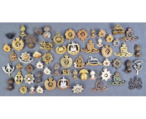 A large collection of assorted WWI First World War, WWII Second World War (and other) British Army officers uniform cap badge