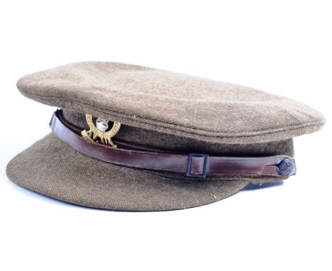 A WWI First World War period c1919 British Army Officer's cap from the 15th/19th King's Royal Hussars regiment. The peaked ca