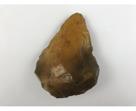 A Palaeolithic Acheulean flint hand axe, 14 cm x 10 cm