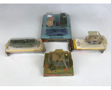 Vintage military Dinky Toys, including 677 Task Force Set, 681 D.U.K.W Amphibian, 680 Ferret Armoured Car and 601 Austin Para