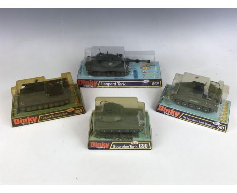 Vintage military Dinky Toys, including 699 Leopard Recovery Tank, 692 Leopard Tank, 690 Scorpion Tank, and 691 Striker Anti-T